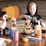 cute-children-with-pumpkins-halloween-concept
